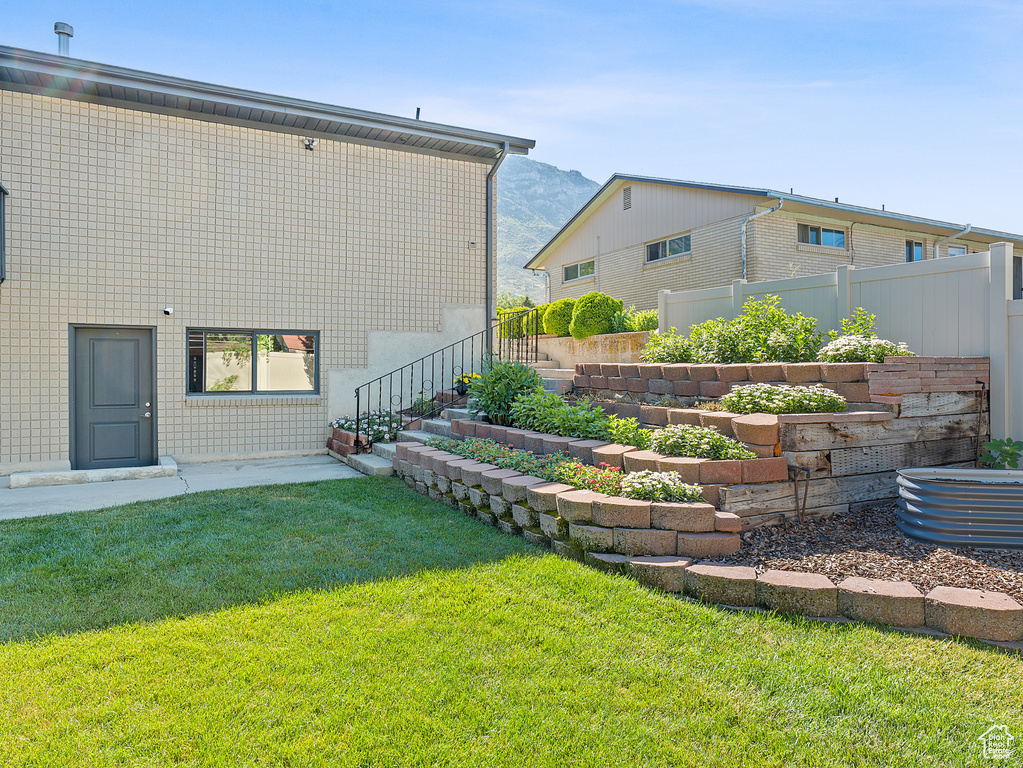 View of yard featuring a mountain view