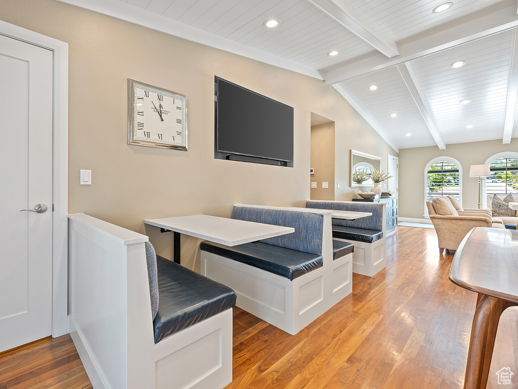 Dining area featuring light wood-style flooring, recessed lighting, and wooden ceiling