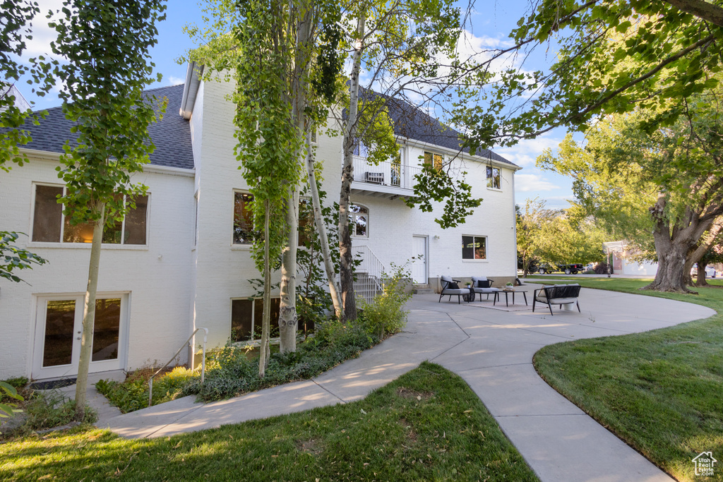 Surrounding community featuring a yard and a patio area
