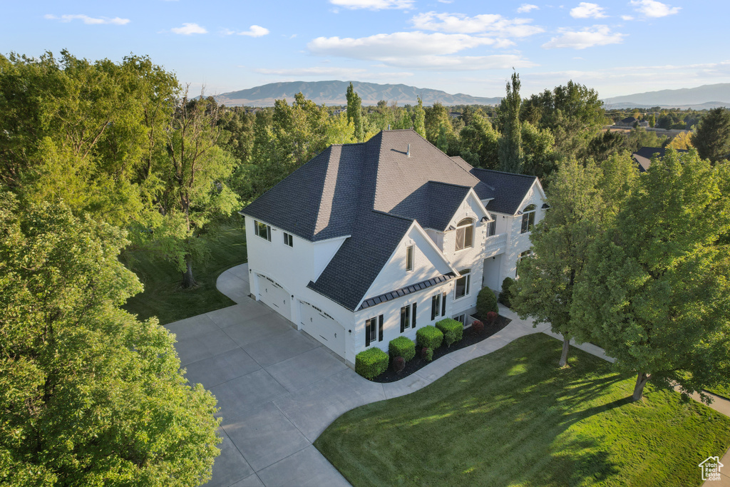 View of subject property with mountains
