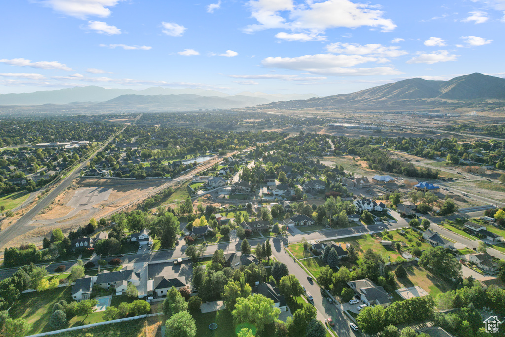 Aerial view of property\\\'s location featuring mountains and nearby suburban area