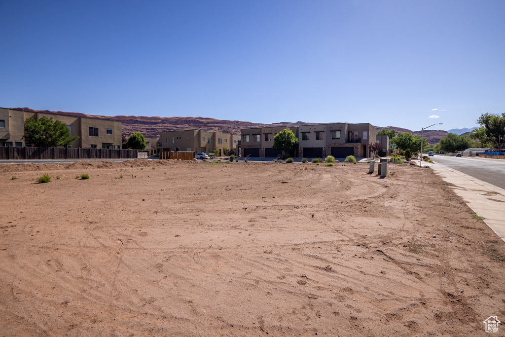 View of yard featuring a mountain view and a residential view