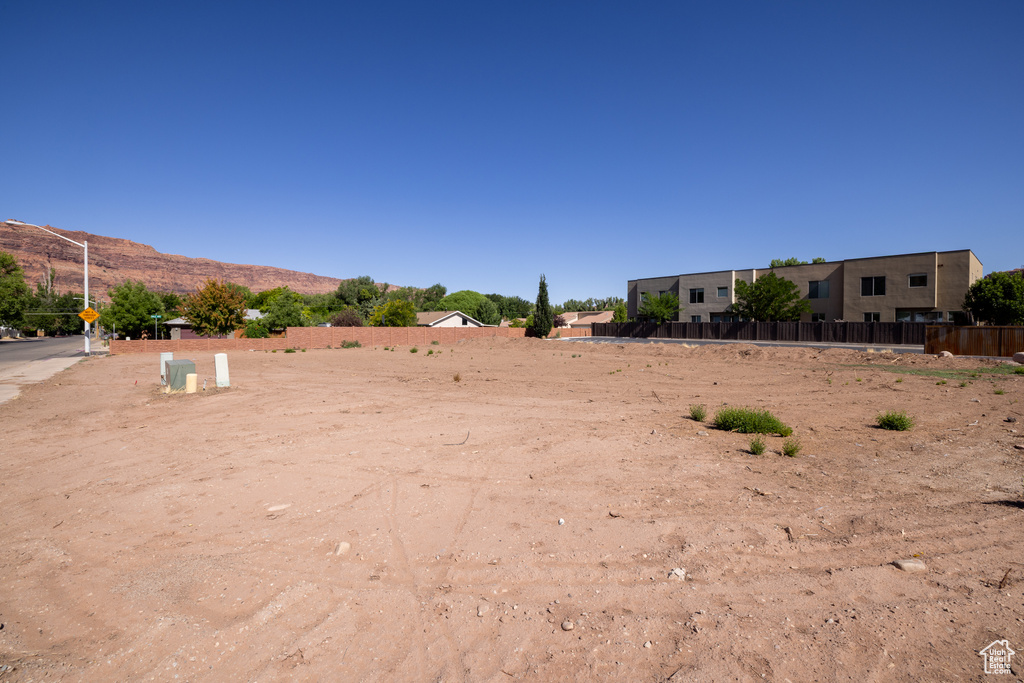 View of yard with a mountain view
