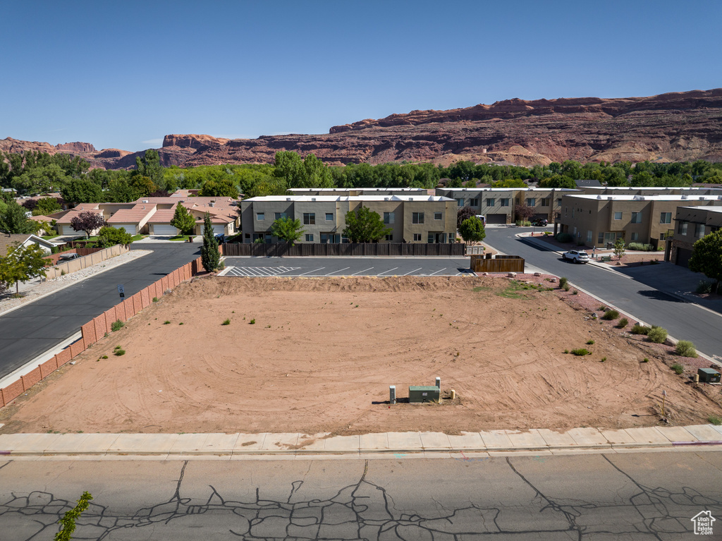 View of mountain backdrop with nearby suburban area