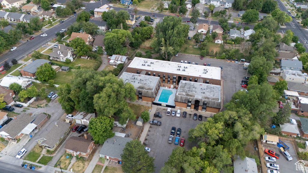 Aerial view of property's location with nearby suburban area