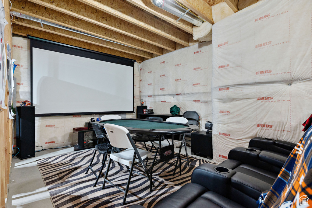 Playroom with concrete flooring and heating unit
