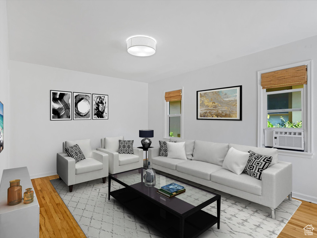 Living area featuring light wood-type flooring and plenty of natural light