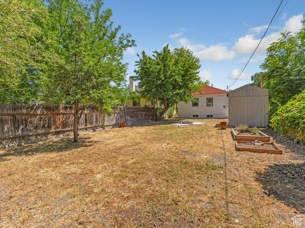 View of yard featuring a vegetable garden