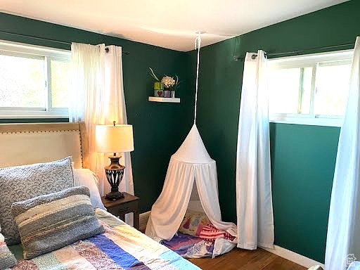 Bedroom with wood finished floors