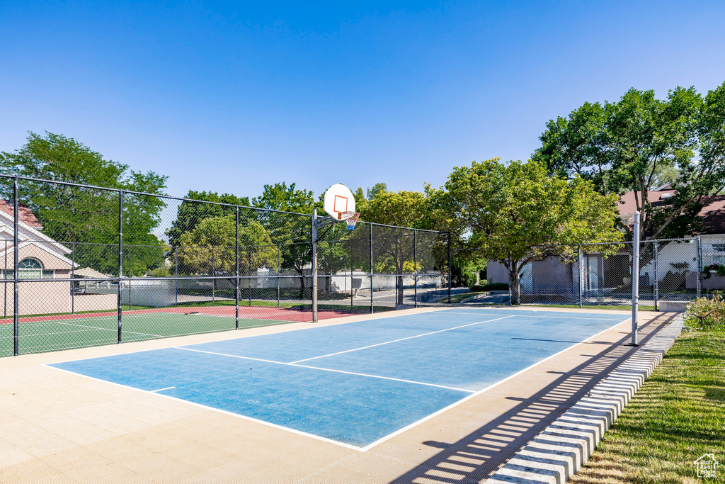 View of basketball court with community basketball court and a tennis court