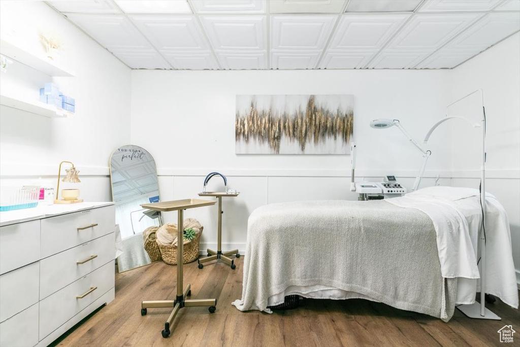 Bedroom with wood finished floors