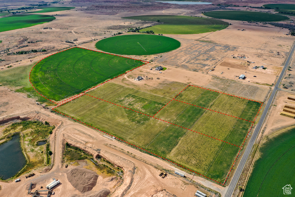 Aerial view of property's location with property boundaries highlighted and a large body of water