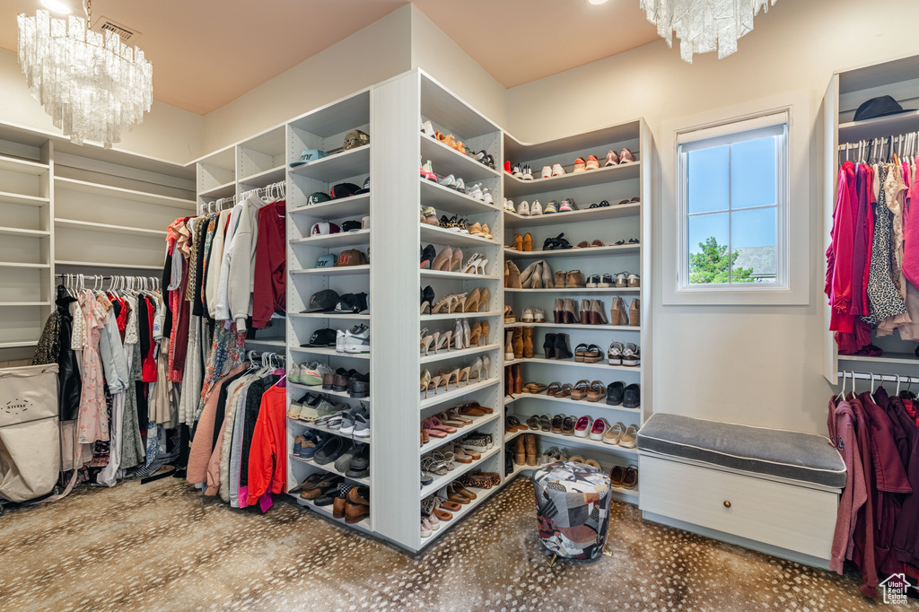 Spacious closet with a chandelier