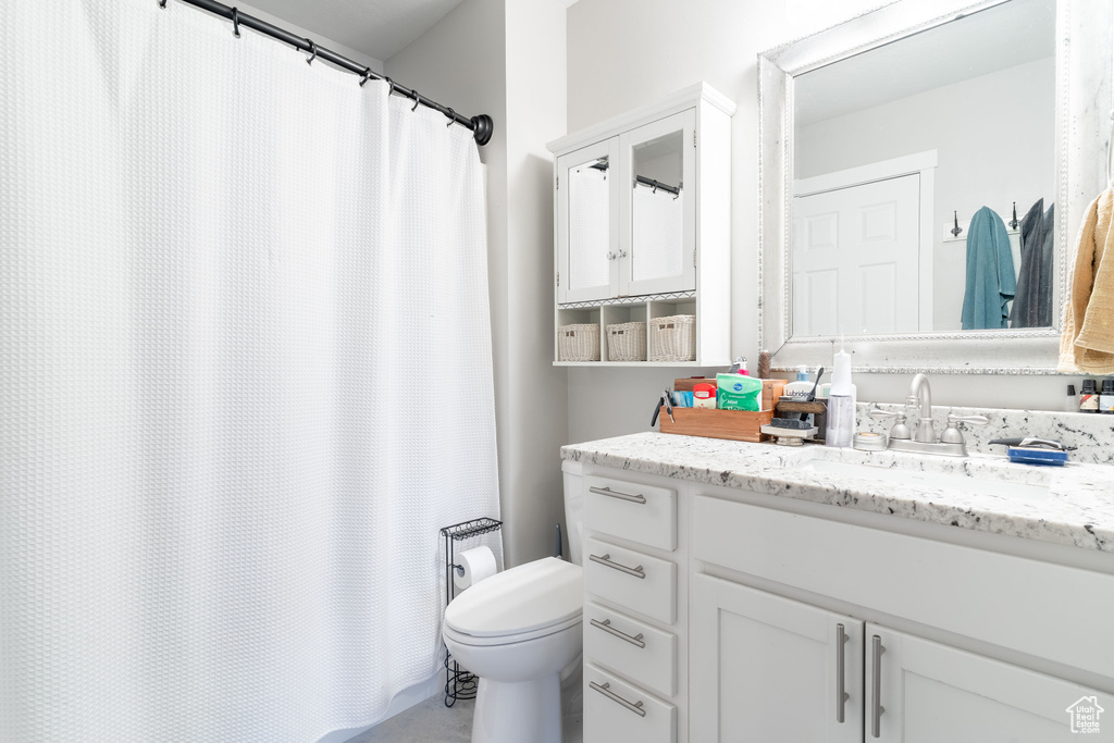 Bathroom with vanity and a shower with curtain