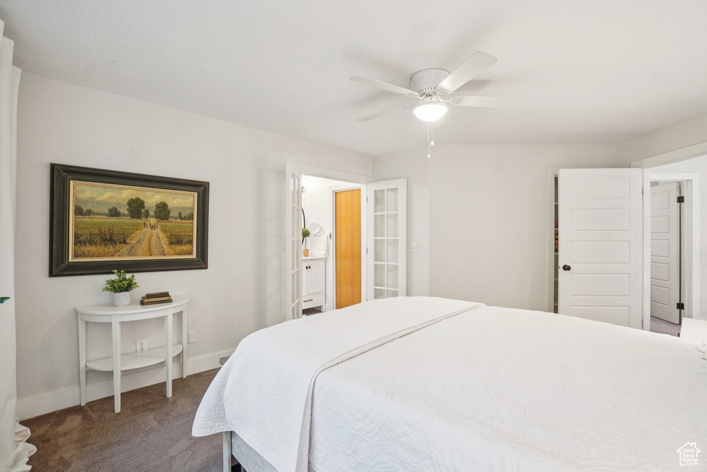 Bedroom featuring carpet and ceiling fan