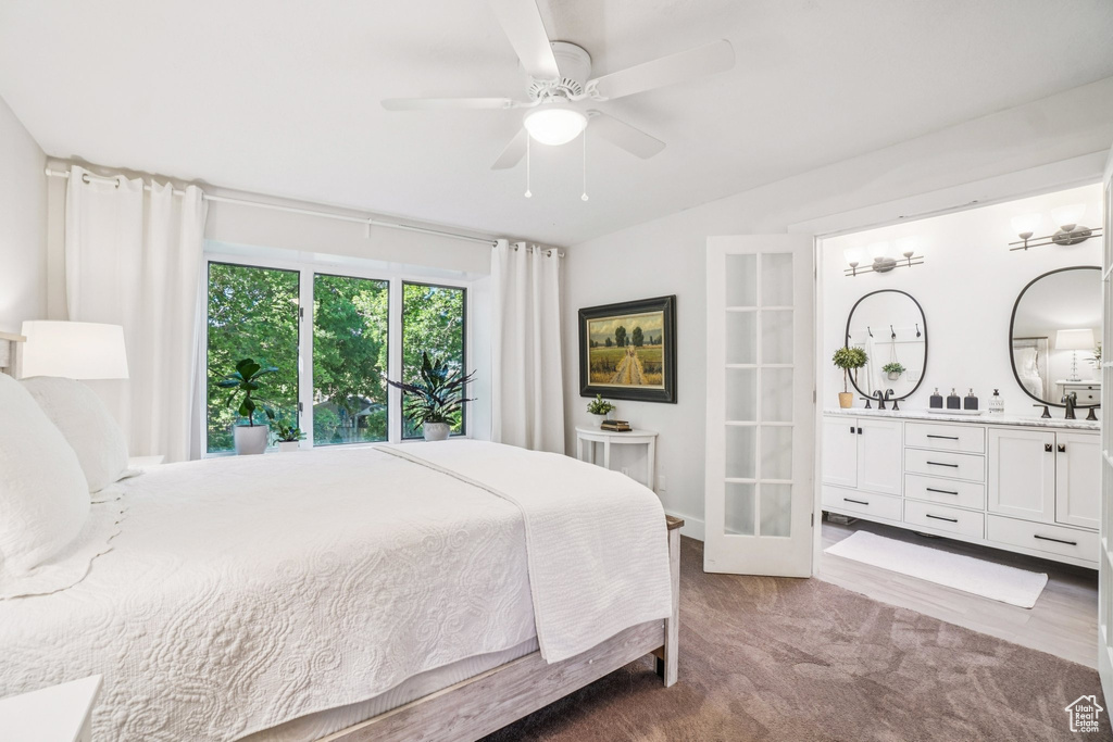 Bedroom featuring carpet and a ceiling fan