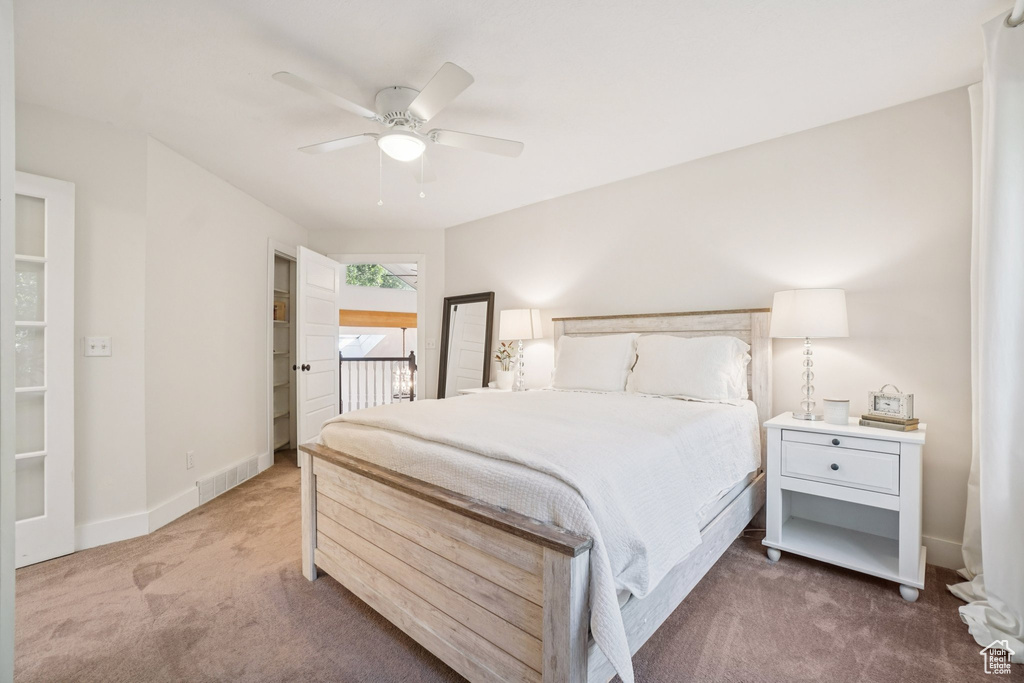 Bedroom featuring carpet flooring and a ceiling fan
