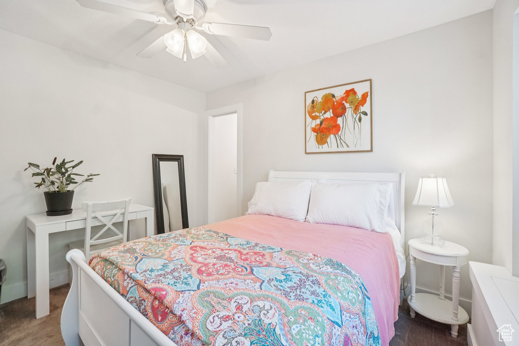 Bedroom featuring carpet and ceiling fan