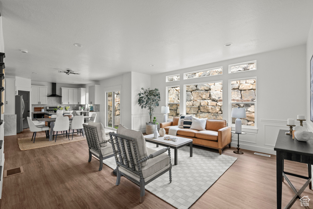 Living area featuring light wood finished floors
