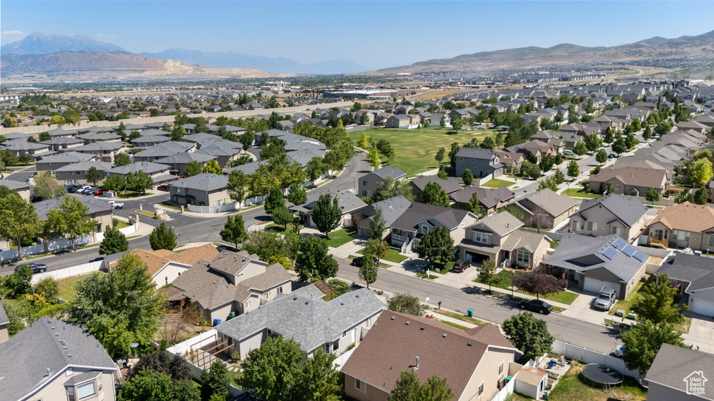 View of property location with nearby suburban area and mountains