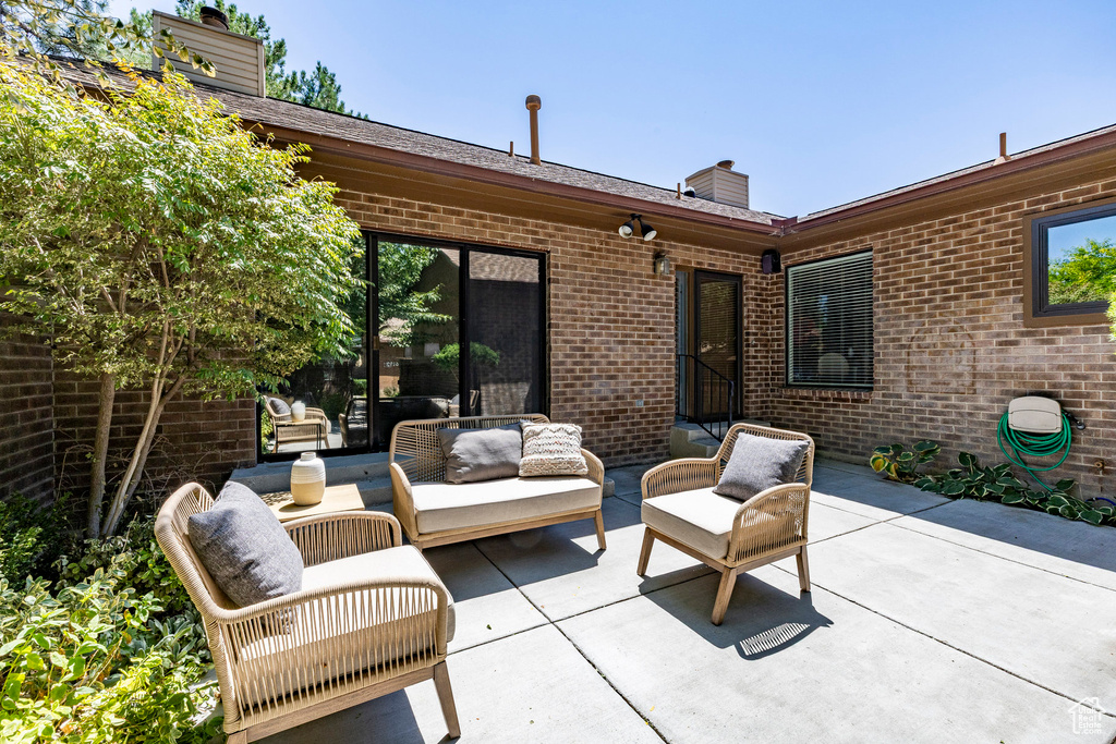 View of patio with outdoor lounge area