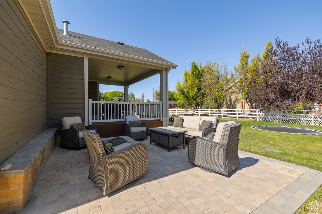 View of patio with an outdoor living space