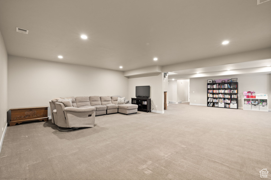 Living room featuring carpet floors and recessed lighting