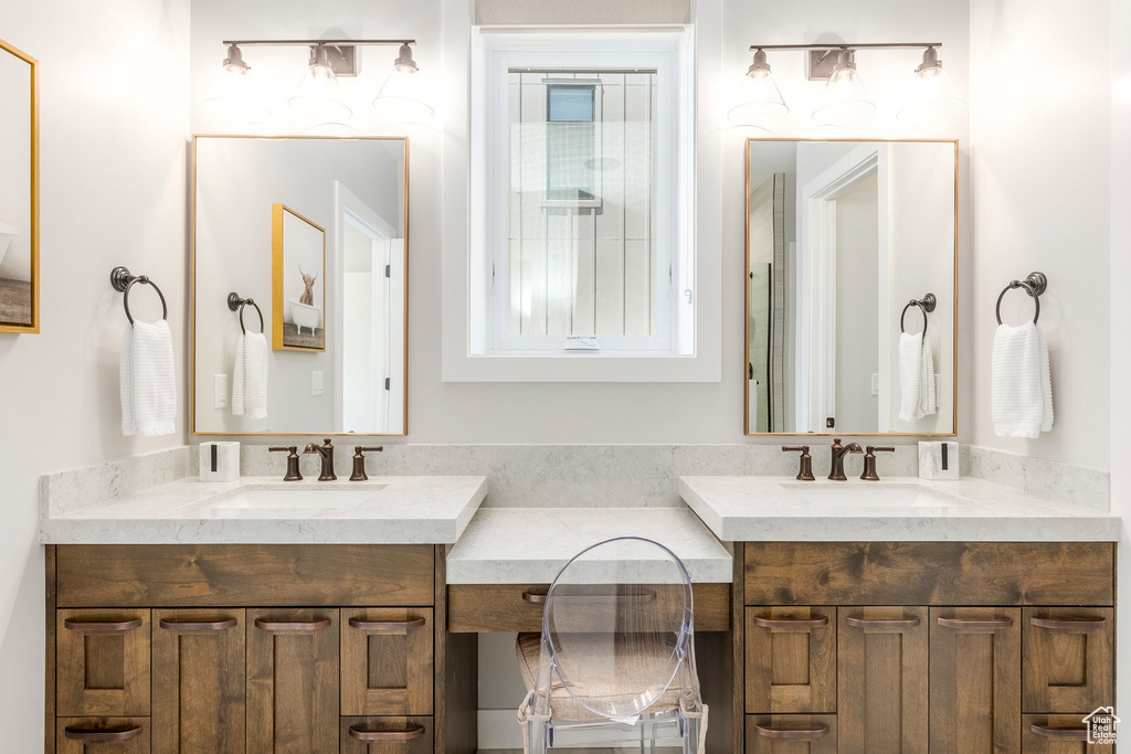 Full bath featuring vanity