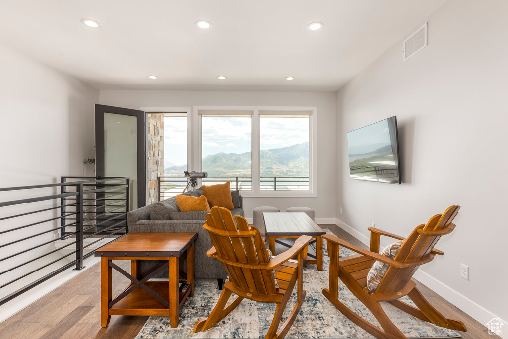 Living room featuring recessed lighting and light wood-style floors