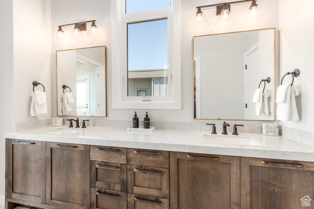 Bathroom featuring double vanity