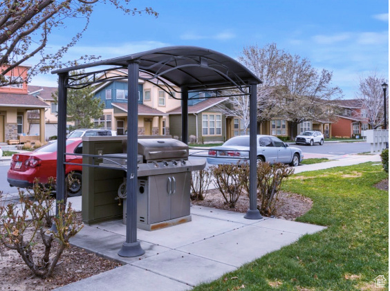 View of patio / terrace with grilling area and a residential view