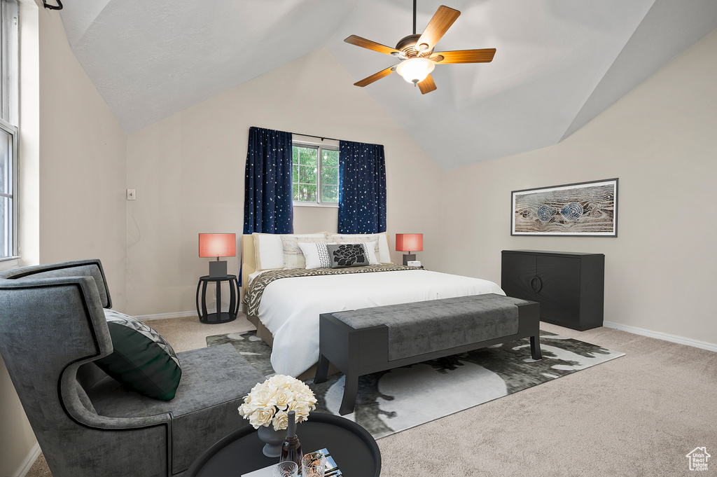 Bedroom featuring lofted ceiling, carpet floors, and ceiling fan