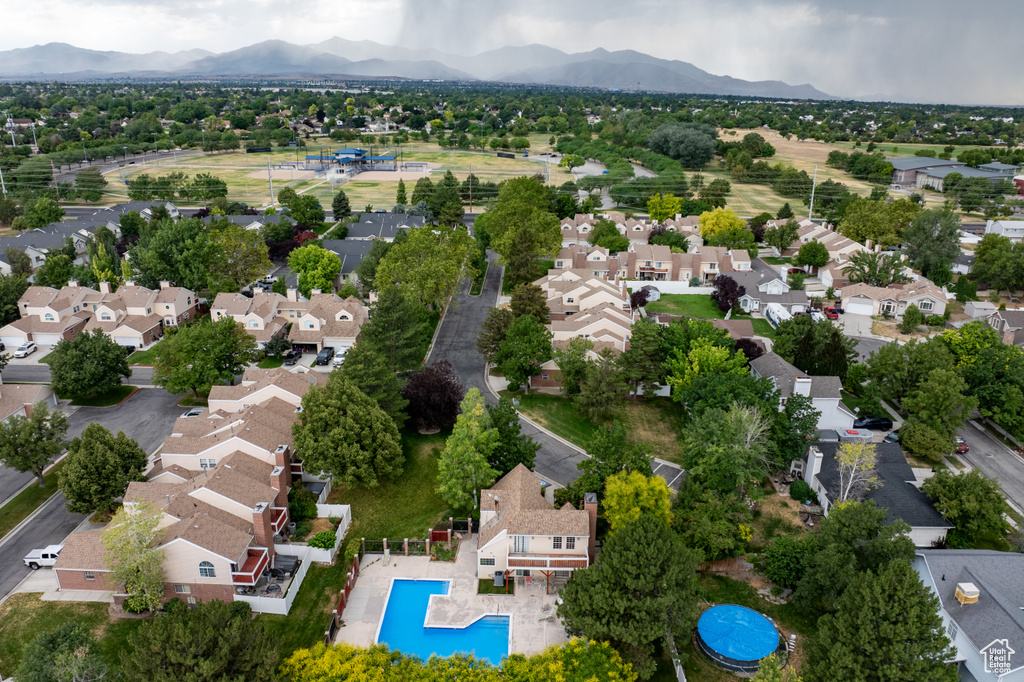 Aerial view of residential area with a mountainous background