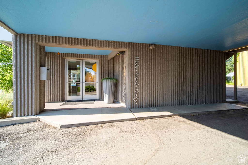 Entrance to property featuring french doors