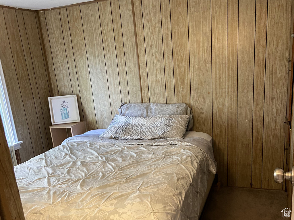Bedroom with wood finished floors