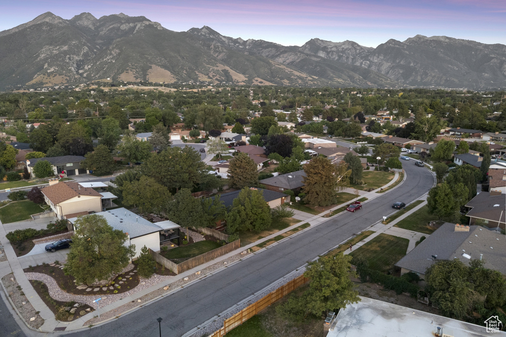 Aerial view at dusk of a mountain view and a residential view