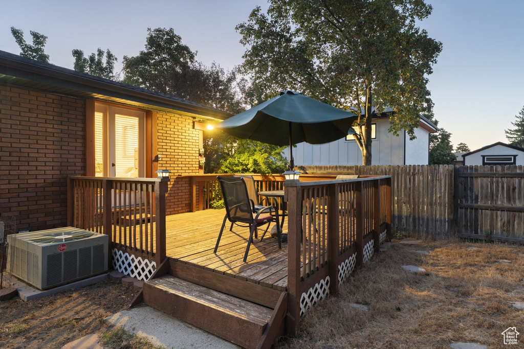 Wooden terrace with outdoor dining area