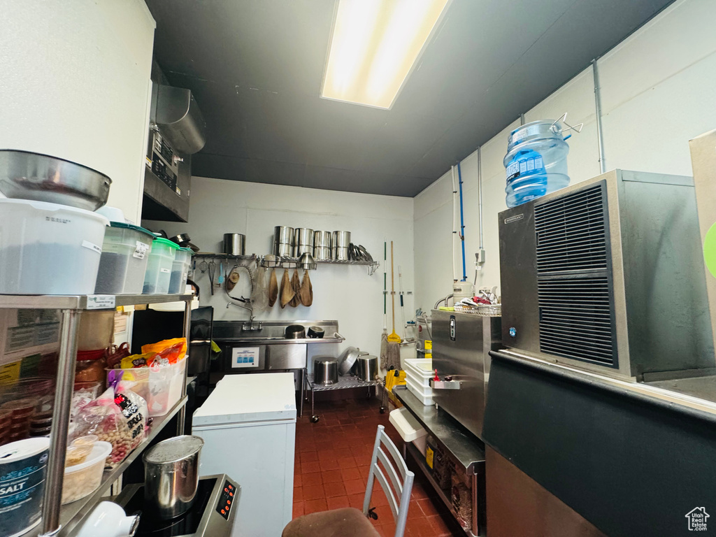 Kitchen with refrigerator