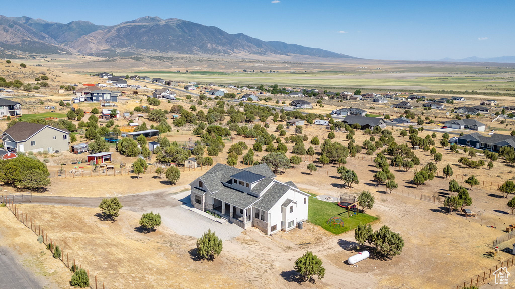 View from above of property featuring a mountainous background