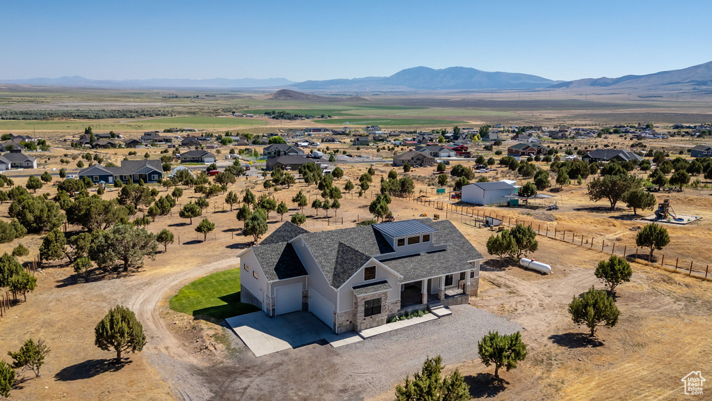 View from above of property featuring a mountainous background