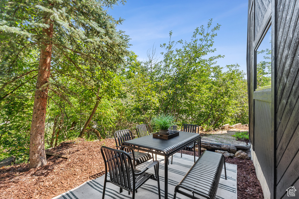 View of patio with outdoor dining space