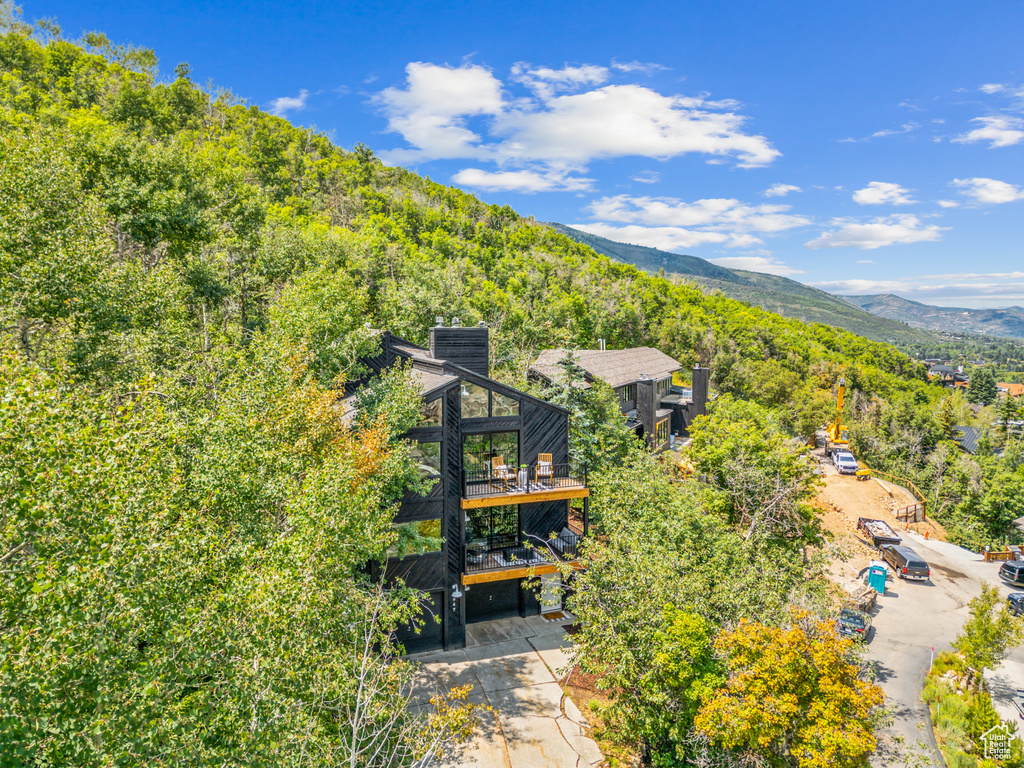 Bird's eye view of mountains and a heavily wooded area