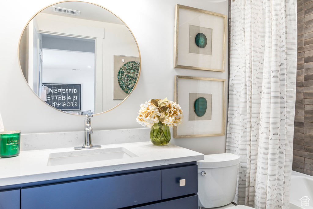 Full bath with vanity and shower / bathtub combination with curtain