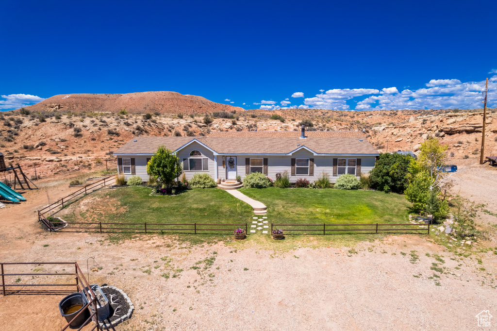 View of front of property featuring a mountain view