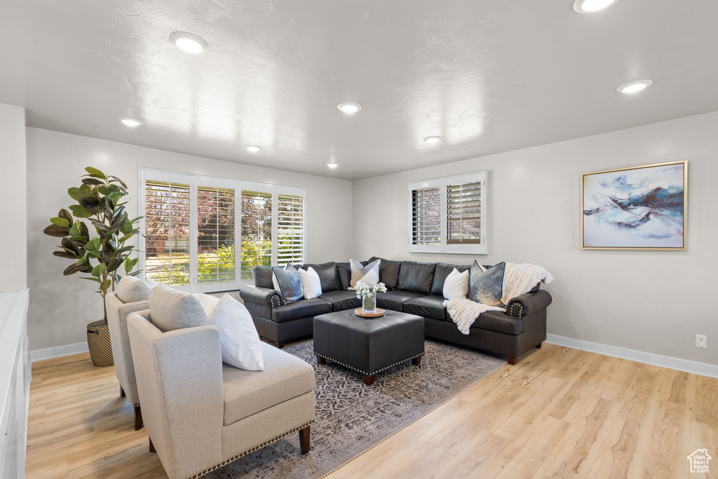 Living room featuring recessed lighting and wood finished floors