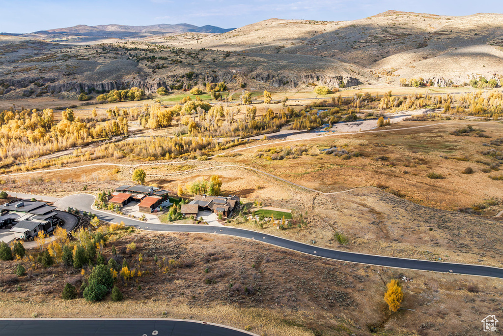 Aerial view of property's location with mountains