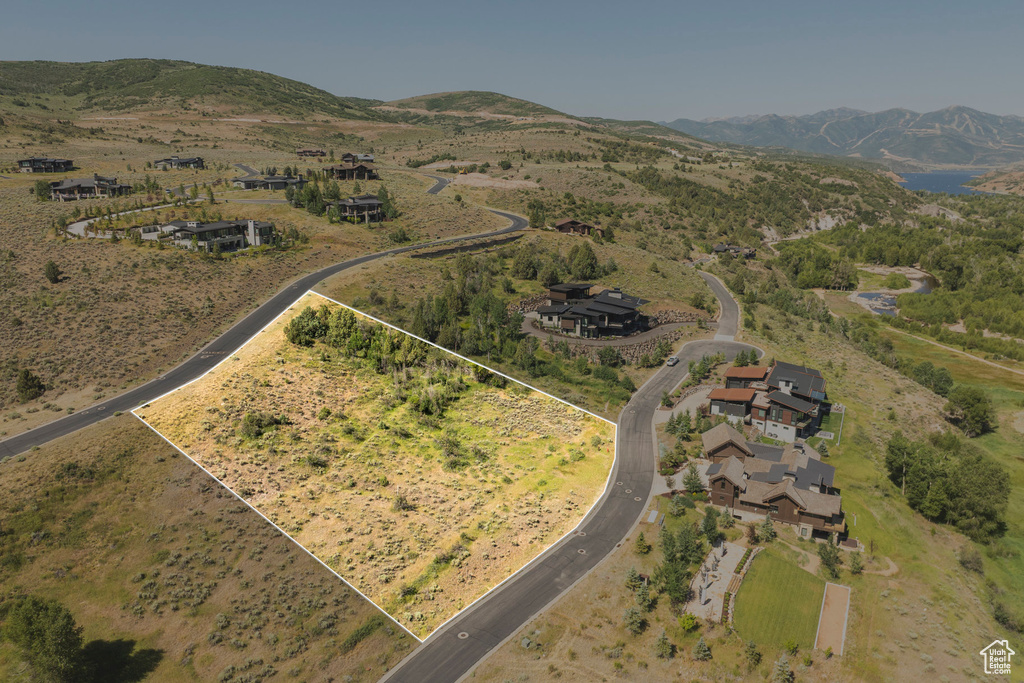 View of property location with property parcel outlined and mountains