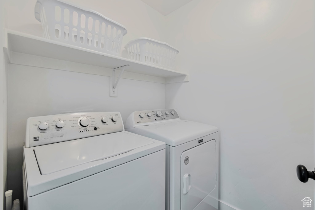 Laundry room featuring washing machine and dryer