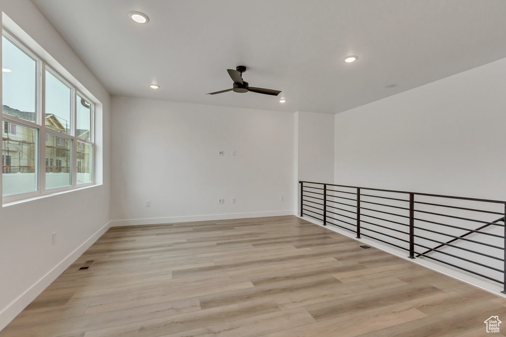 Spare room with ceiling fan, recessed lighting, and light wood-style flooring