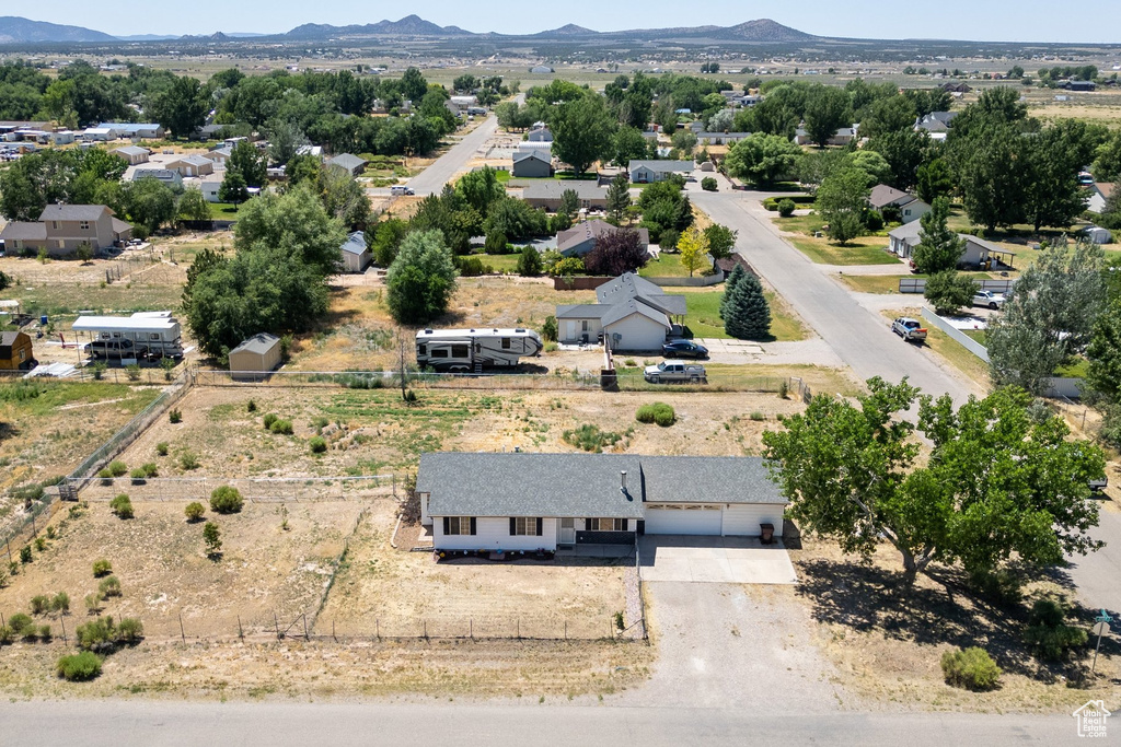 View of subject property featuring mountains